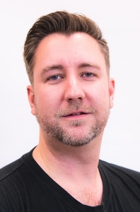 Headshot for Adam Rodgers